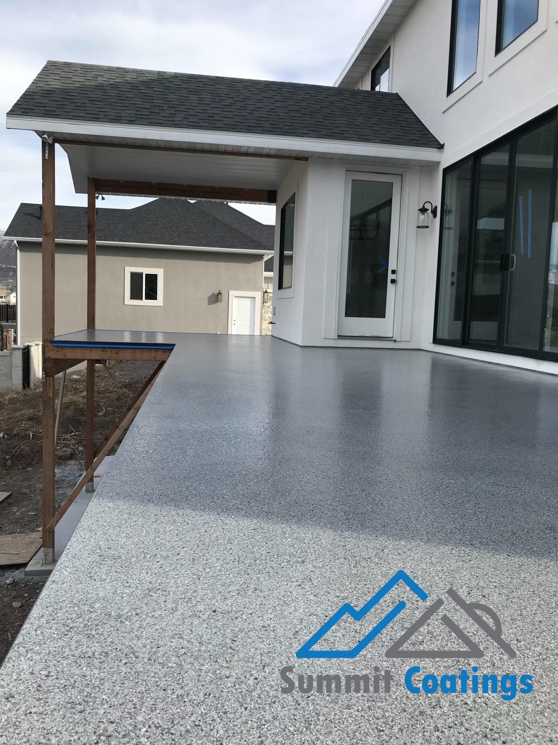 Finished waterproof flake coating on an elevated Utah deck